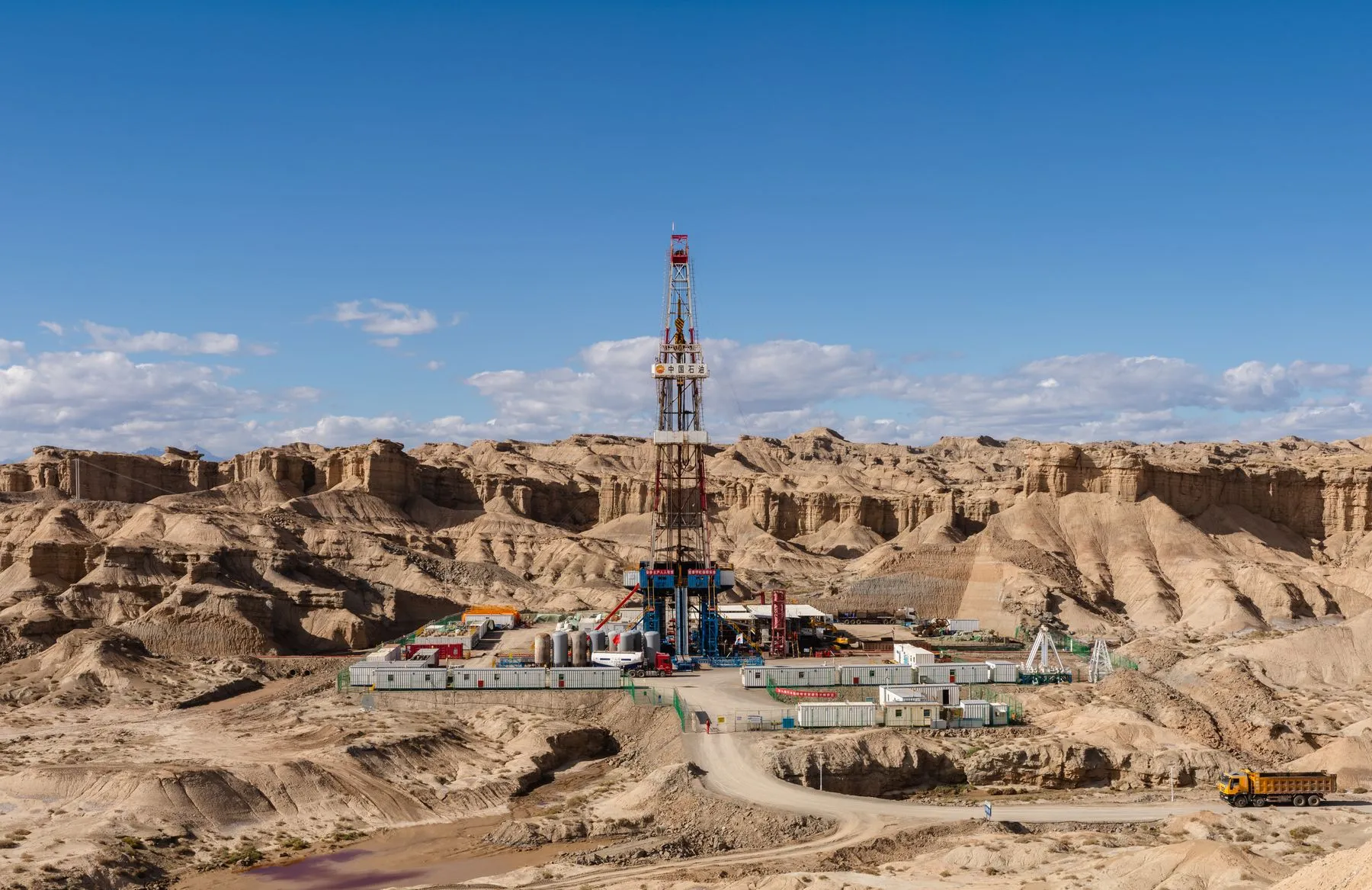 Drilling rig on a completed AFCCO location